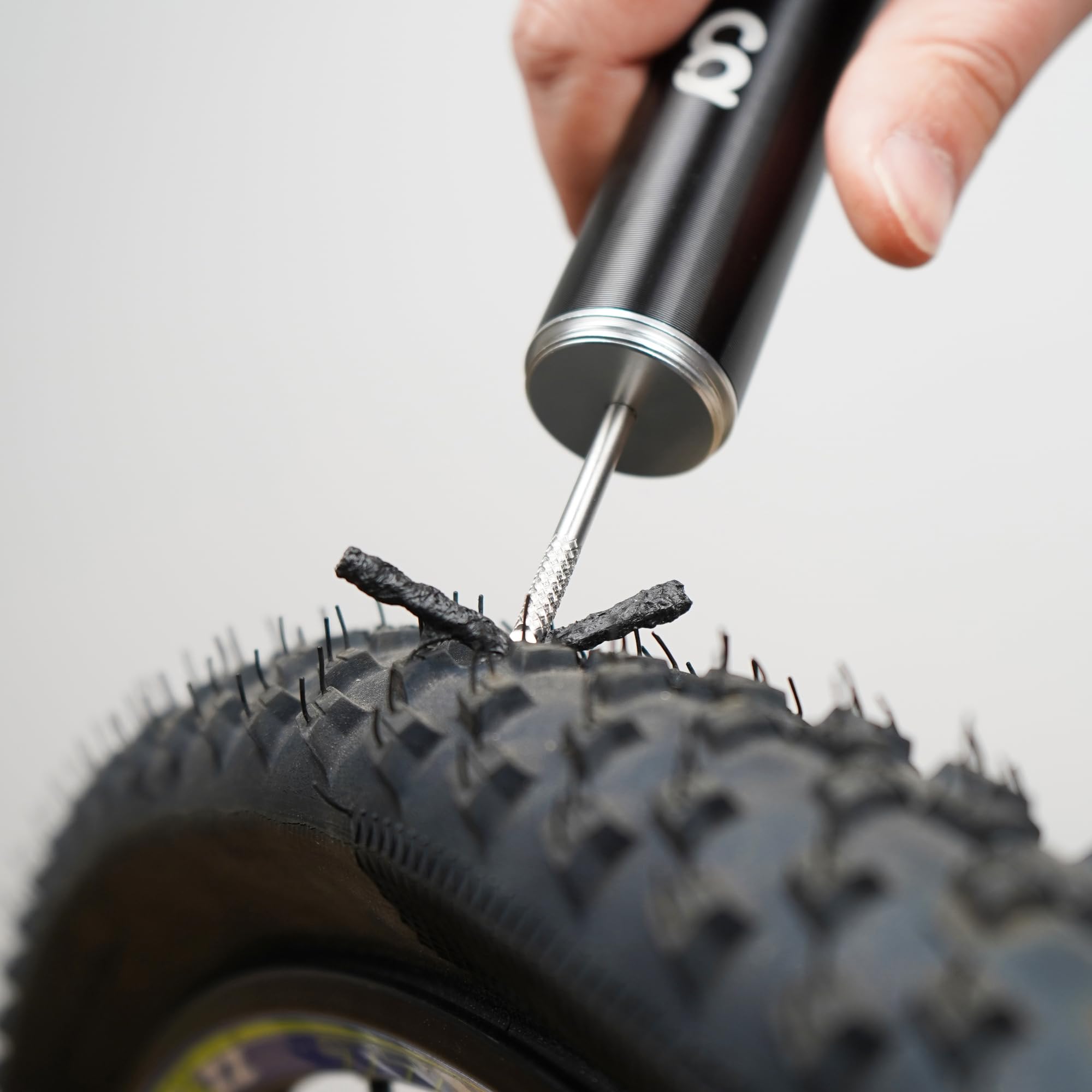 CyclingDeal 2 in 1 Mini Ratchet Bicycle Repair Tool Kit - CNC Alloy Storage Capsule and Bracket - Portable Multi-Tool Wrench- Tubeless MTB Mountain Road Bike Tire Repair Plug Kit - Image 3